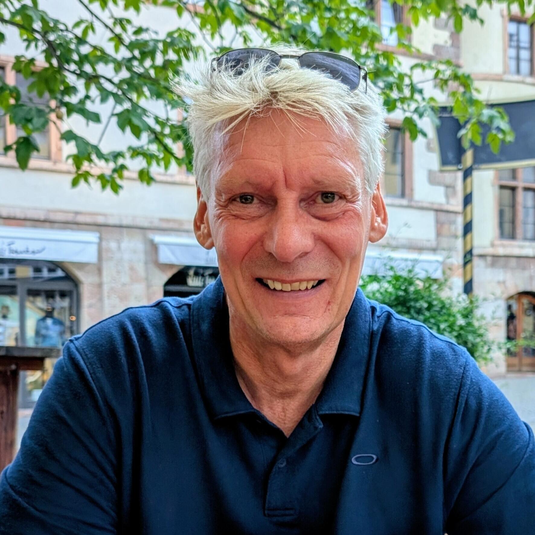 Der Dozent André Kränzke lächelt auf dem Foto