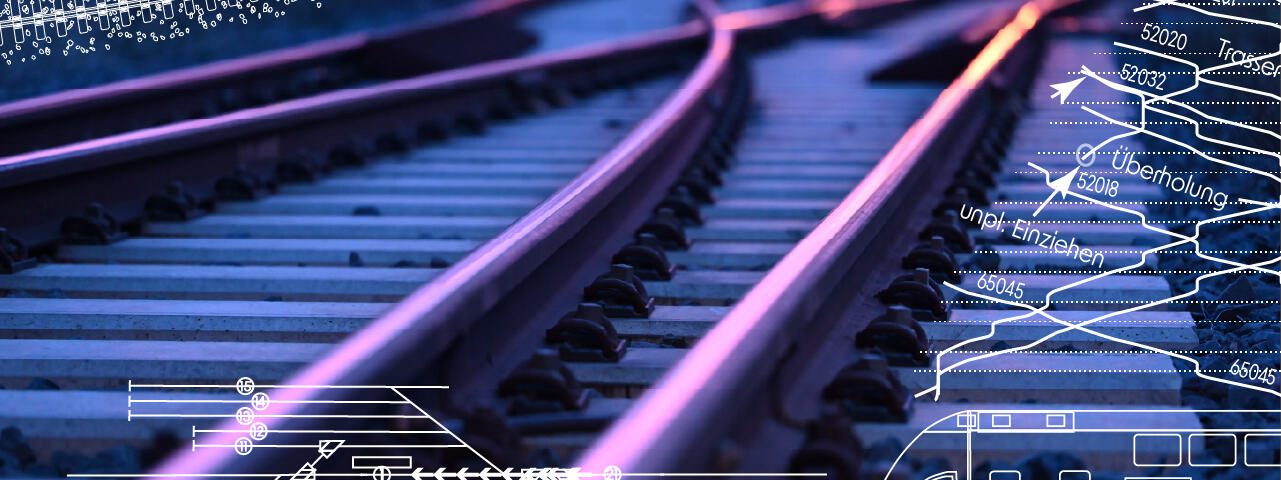 Zu sehen ist eine Eisenbahnschiene mit technischen Zeichnungen