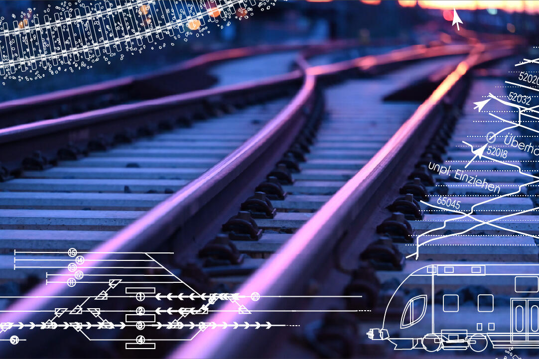 Zu sehen ist eine Eisenbahnschiene mit technischen Zeichnungen